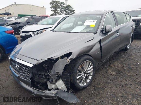 2019 Infiniti Q50 Luxe z VIN JN1EV7AP5KM518681, wystawiony jako IAAI lot #41958746 z przebiegiem 66 629 mil mil oraz . Historia ofert i sprzedaży dostępna na DreamBid. Obrazek 6.