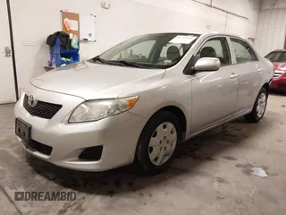 2009 Toyota Corolla with VIN 1NXBU40E69Z129314, listed as a IAAI auction lot 41718098 with 170,739 mi miles. Bid and sale history available at carsss.com. Image 2.