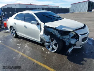 2014 Chevrolet Malibu LTZ with VIN 1G11J5SXXEF114531, listed as a IAAI auction lot 41409618 with 153,040 mi miles. Bid and sale history available at carsss.com. Image 1.