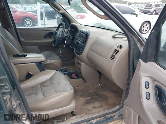2002 Ford Escape with VIN 1FMCU02132KD51298, listed as a IAAI auction lot 41550132 with 218,830 mi miles and . Bid and sale history available at DreamBid. Image 5.