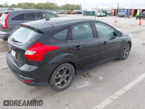 2014 Ford Focus SE with VIN 1FADP3K22EL325404, listed as a IAAI auction lot 42060162 with 115,265 mi miles. Bid and sale history available at carsss.com. Image 4.