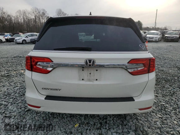 2019 Honda Odyssey EX-L with VIN 5FNRL6H72KB014960, listed as a Copart auction lot 48701035 with 131,921 mi miles and Salvage Title. Bid and sale history available at carsss.com. Image 6.