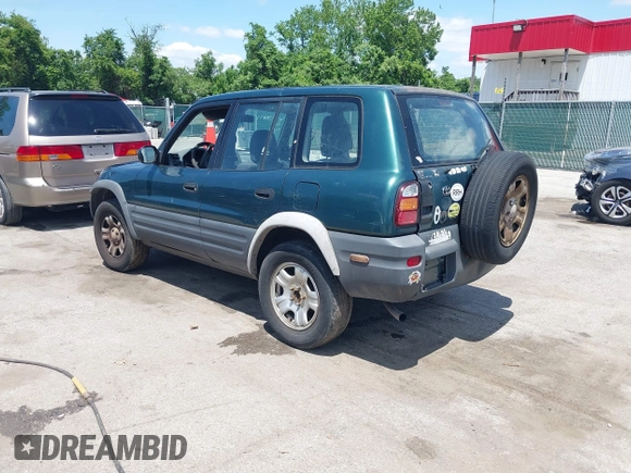 1998 Toyota RAV4 with VIN JT3GP10V6W0023680, listed as a IAAI auction lot 42235877 with 244,446 mi miles and . Bid and sale history available at DreamBid. Image 3.
