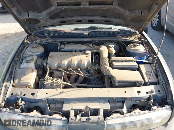 1996 Saturn SL with VIN 1G8ZF5289TZ265189, listed as a IAAI auction lot 41618552 with 264,742 mi miles. Bid and sale history available at carsss.com. Image 6.