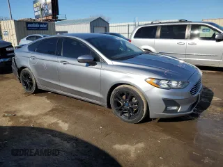2020 Ford Fusion SE with VIN 3FA6P0HD8LR128879, listed as a Copart auction lot 89090425 with 129,784 mi miles and Salvage Title. Bid and sale history available at carsss.com. Image 4.
