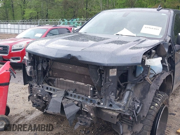 2021 Chevrolet Silverado 1500 LT z VIN 1GCUYDET1MZ294871, wystawiony jako IAAI lot #41968489 z przebiegiem 90 733 mil mil oraz . Historia ofert i sprzedaży dostępna na DreamBid. Obrazek 6.