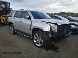 2018 GMC Yukon Denali with VIN 1GKS2CKJ4JR161009, listed as a Copart auction lot 74598914 with 106,891 mi miles and Salvage Title. Bid and sale history available at carsss.com. Image 4.