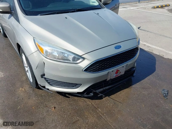 2016 Ford Focus SE with VIN 1FADP3F20GL329724, listed as a IAAI auction lot 41665265 with 131,000 mi miles. Bid and sale history available at carsss.com. Image 6.
