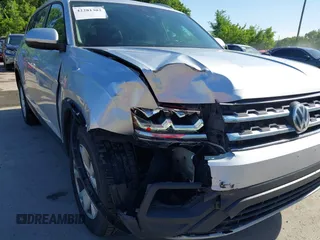 2019 Volkswagen Atlas SE with VIN 1V2UR2CA2KC557449, listed as a IAAI auction lot 42281302 with 106,739 mi miles and . Bid and sale history available at DreamBid. Image 6.