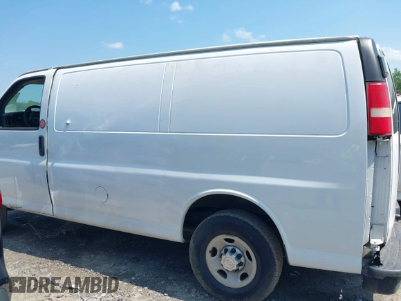 2014 Chevrolet Express Cargo with VIN 1GCWGFCA2E1198370, listed as a IAAI auction lot 42143804 with Not provided miles and . Bid and sale history available at DreamBid. Image 13.