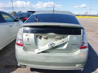 2007 Toyota Prius z VIN JTDKB20U877556527, wystawiony jako IAAI lot #41965245 z przebiegiem 259 572 mil mil oraz . Historia ofert i sprzedaży dostępna na DreamBid. Obrazek 16.