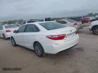 2015 Toyota Camry XLE with VIN 4T1BF1FKXFU044073, listed as a IAAI auction lot 41937262 with 176,392 mi miles. Bid and sale history available at carsss.com. Image 3.