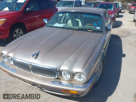 1998 Jaguar XJ Vanden Plas with VIN SAJKX6242WC823240, listed as a IAAI auction lot 41605734 with Not Provided miles and . Bid and sale history available at DreamBid. Image 6.