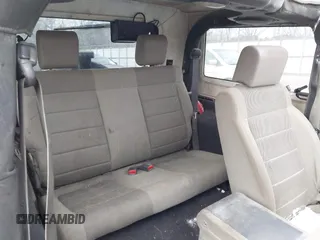 2007 Jeep Wrangler Sahara z VIN 1J8FA54107L202622, wystawiony jako IAAI lot #41391138 z przebiegiem 251 388 mil mil oraz . Historia ofert i sprzedaży dostępna na DreamBid. Obrazek 8.