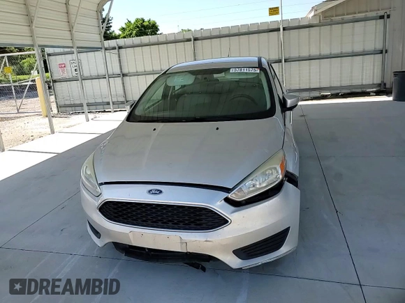 2016 Ford Focus SE with VIN 1FADP3F27GL336945, listed as a Copart auction lot 57811575 with 134,015 mi miles and Salvage title. Bid and sale history available at DreamBid. Image 13.