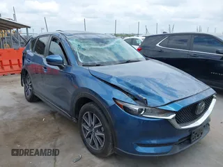 2018 Mazda CX-5 Touring z VIN JM3KFACM5J1442416, wystawiony jako IAAI lot #42093137 z przebiegiem 65 102 mil mil oraz . Historia ofert i sprzedaży dostępna na DreamBid. Obrazek 6.