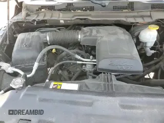 2018 Ram 1500 SLT z VIN 1C6RR6GG2JS234110, wystawiony jako Copart lot #67271245 z przebiegiem 99 170 mil mil oraz Szkoda całkowita • Salvage title. Historia ofert i sprzedaży dostępna na DreamBid. Obrazek 13.