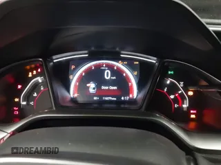 2019 Honda Civic Sport with VIN 19XFC2F86KE022749, listed as a IAAI auction lot 42127993 with 116,279 mi miles and . Bid and sale history available at DreamBid. Image 7.