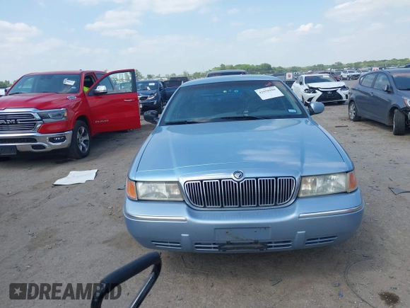 2000 Mercury Grand Marquis LS z VIN 2MEFM75W1YX673105, wystawiony jako IAAI lot #42050980 z przebiegiem 154 944 mil mil oraz . Historia ofert i sprzedaży dostępna na DreamBid. Obrazek 12.