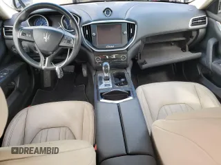 2015 Maserati Ghibli z VIN ZAM57XSA5F1129866, wystawiony jako Copart lot #51738015 z przebiegiem Nie podano mil oraz Szkoda całkowita • Salvage title. Historia ofert i sprzedaży dostępna na DreamBid. Obrazek 8.