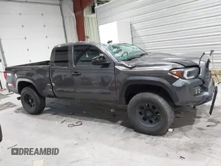 2021 Toyota Tacoma SR with VIN 3TYRX5GN8MT011370, listed as a IAAI auction lot 41287330 with 73,447 mi miles and . Bid and sale history available at DreamBid. Image 13.
