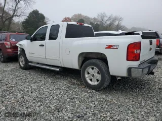 2013 Chevrolet Silverado 1500 LT with VIN 1GCRCSE05DZ232372, listed as a Copart auction lot 82697944 with 144,009 mi miles and Salvage Title. Bid and sale history available at carsss.com. Image 2.
