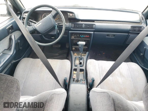 1988 Toyota Camry z VIN JT2SV21E7J3277138, wystawiony jako Copart lot #80039334 z przebiegiem 152 555 mil mil oraz Szkoda całkowita • Salvage title. Historia ofert i sprzedaży dostępna na DreamBid. Obrazek 8.