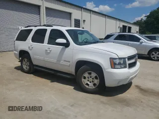 2013 Chevrolet Tahoe LT with VIN 1GNSCBE07DR268458, listed as a Copart auction lot 54859725 with 172,063 mi miles and Salvage title. Bid and sale history available at DreamBid. Image 4.