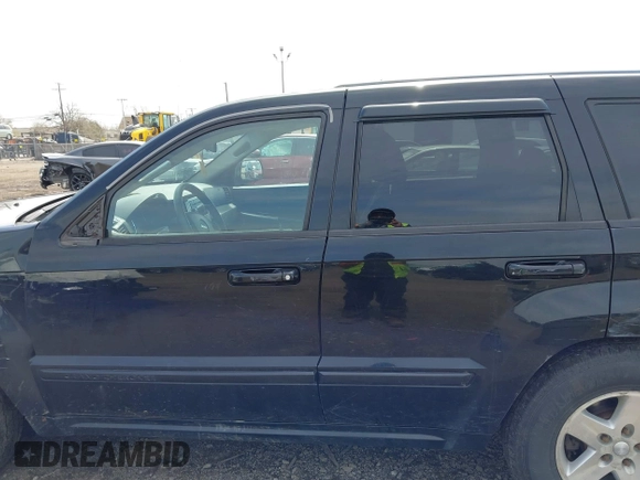 2008 Jeep Grand Cherokee Laredo with VIN 1J8GR48K48C119836, listed as a IAAI auction lot 42114083 with 129,352 mi miles. Bid and sale history available at carsss.com. Image 14.