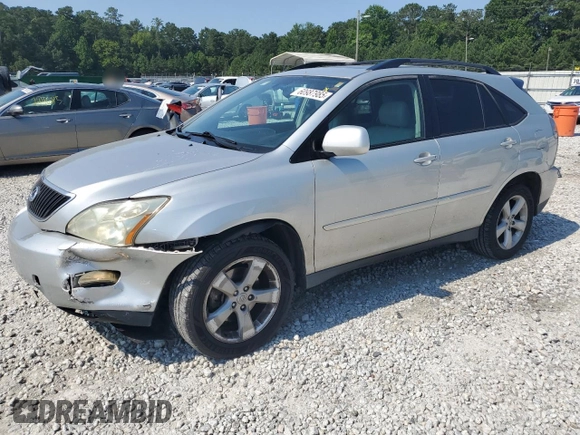 2006 Lexus RX 330 with VIN 2T2GA31U46C045659, listed as a Copart auction lot 60987985 with 122,714 mi miles and Salvage title. Bid and sale history available at DreamBid. Image 1.