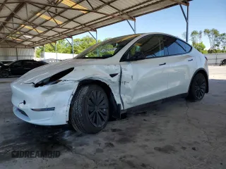 2024 Tesla Model Y with VIN 7SAYGDED5RF086456, listed as a Copart auction lot 57994835 with Not provided miles and Salvage title. Bid and sale history available at DreamBid. Image 1.