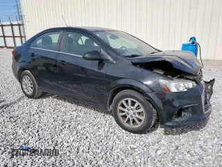 2017 Chevrolet Sonic LT with VIN 1G1JD5SH2H4176859, listed as a Copart auction lot 56787705 with 98,921 mi miles and Salvage title. Bid and sale history available at DreamBid. Image 4.