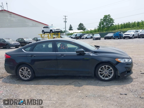 2020 Ford Fusion SE with VIN 3FA6P0LU5LR142665, listed as a IAAI auction lot 42415611 with 101,686 mi miles and . Bid and sale history available at DreamBid. Image 12.