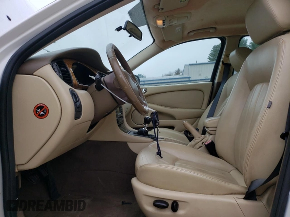 2005 Jaguar X-Type z VIN SAJWB52D95XE23602, wystawiony jako Copart lot #51172275 z przebiegiem 143 550 mil mil oraz Czysty tytuł • Clean title. Historia ofert i sprzedaży dostępna na DreamBid. Obrazek 7.
