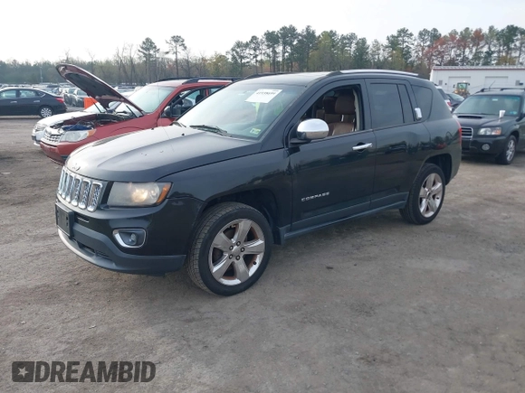2014 Jeep Compass Limited with VIN 1C4NJDCB9ED549543, listed as a IAAI auction lot 41938699 with 195,973 mi miles. Bid and sale history available at carsss.com. Image 2.