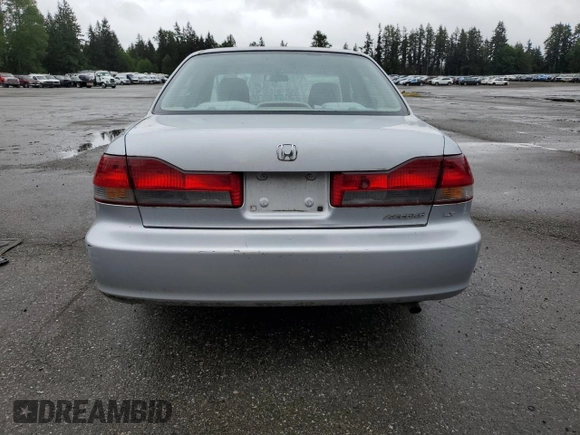 2002 Honda Accord LX z VIN 3HGCG56412G708628, wystawiony jako Copart lot #57347935 z przebiegiem 146 894 mil mil oraz Szkoda całkowita • Salvage title. Historia ofert i sprzedaży dostępna na DreamBid. Obrazek 6.