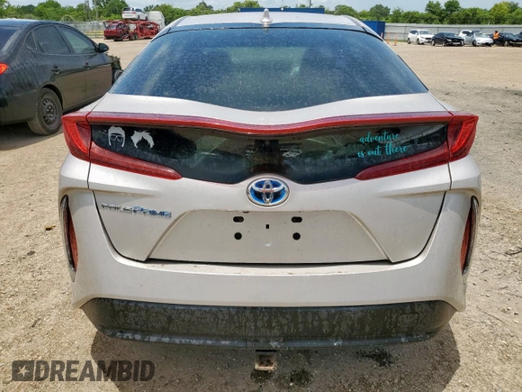 2021 Toyota Prius LE z VIN JTDKAMFP8M3177157, wystawiony jako Copart lot #63668045 z przebiegiem 44 760 mil mil oraz Czysty tytuł • Clean title. Historia ofert i sprzedaży dostępna na DreamBid. Obrazek 6.