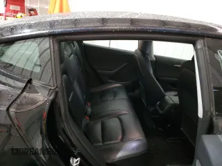 2023 Tesla Model 3 with VIN 5YJ3E1EA8PF451324, listed as a Copart auction lot 88318475 with 74,582 mi miles and Salvage Title. Bid and sale history available at DreamBid. Image 10.