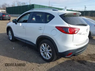 2014 Mazda CX-5 Grand Touring with VIN JM3KE4DY7E0425201, listed as a IAAI auction lot 41803597 with 118,867 mi miles. Bid and sale history available at carsss.com. Image 3.
