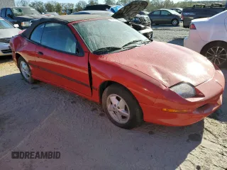 1998 Pontiac Sunfire z VIN 4G2JB32T7WB202549, wystawiony jako Copart lot #75095294 z przebiegiem 38 312 mil mil oraz Szkoda całkowita • Salvage title. Historia ofert i sprzedaży dostępna na DreamBid. Obrazek 4.