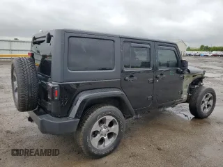 2017 Jeep Wrangler Unlimited Sahara with VIN 1C4BJWEGXHL594203, listed as a Copart auction lot 57359515 with 101,763 mi miles and Salvage title. Bid and sale history available at DreamBid. Image 3.
