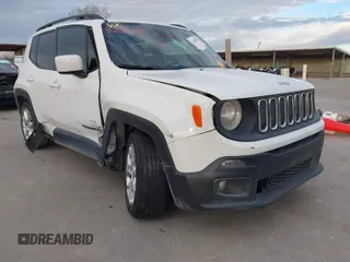 2015 Jeep Renegade Latitude with VIN ZACCJABT9FPB99964, listed as a IAAI auction lot 41250730 with 117,251 mi miles. Bid and sale history available at carsss.com. Image 1.