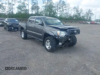 2014 Toyota Tacoma with VIN 5TFLU4EN9EX099414, listed as a IAAI auction lot 40528514 with 122,827 mi miles. Bid and sale history available at carsss.com. Image 1.