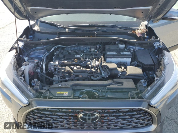 2022 Toyota Corolla Cross XLE с VIN 7MUDAAAG0NV030559, выставлен на аукционе Copart как лот 54075315 с пробегом 28 557 миль миль и Списание • Salvage title. История ставок и продаж доступна на DreamBid. Изображение 11.