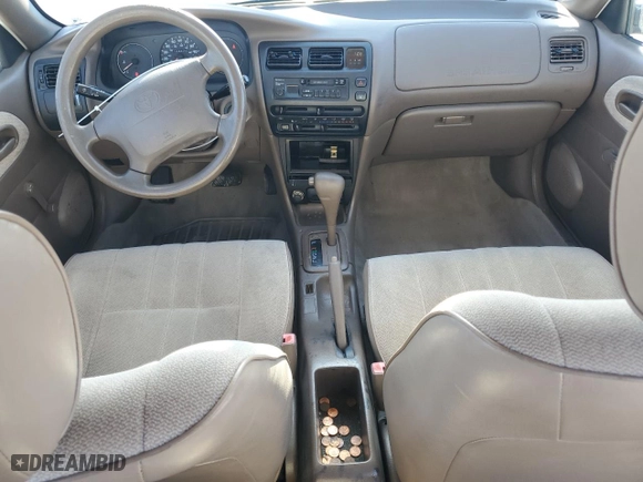 1997 Toyota Corolla with VIN 1NXBA02E0VZ503926, listed as a Copart auction lot 68914944 with 113,176 mi miles and Salvage Title. Bid and sale history available at carsss.com. Image 8.