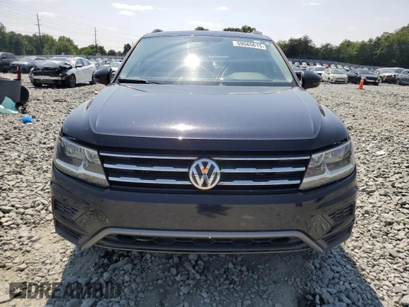 2019 Volkswagen Tiguan SE with VIN 3VV3B7AX9KM012693, listed as a Copart auction lot 59565615 with 137,276 mi miles and Salvage title. Bid and sale history available at DreamBid. Image 5.