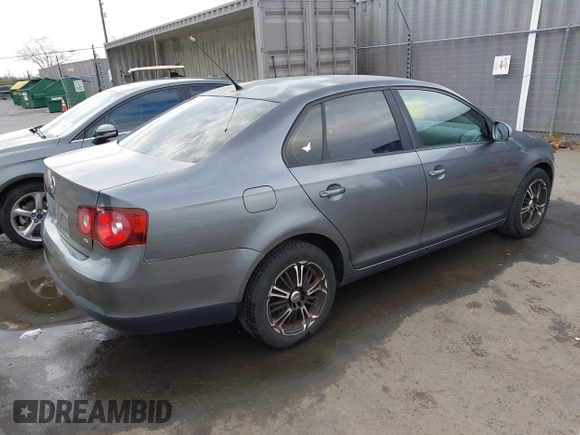 2009 Volkswagen Jetta S with VIN 3VWJZ71K49M053603, listed as a IAAI auction lot 41785816 with 100,065 mi miles and . Bid and sale history available at DreamBid. Image 4.