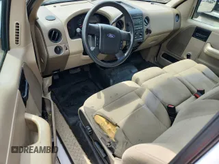 2007 Ford F-150 STX with VIN 1FTRX12W07NA02984, listed as a Copart auction lot 60305325 with 127,731 mi miles and Salvage title. Bid and sale history available at DreamBid. Image 8.