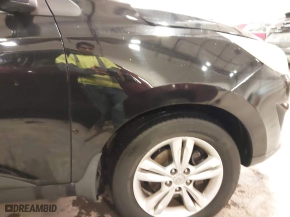 2013 Hyundai Tucson GLS with VIN KM8JU3AC0DU754948, listed as a IAAI auction lot 41811891 with 139,056 mi miles. Bid and sale history available at carsss.com. Image 18.