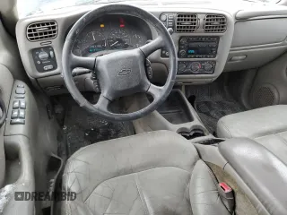 2004 Chevrolet Blazer LS z VIN 1GNDT13XX4K144034, wystawiony jako Copart lot #85671624 z przebiegiem 157 534 mil mil oraz Szkoda całkowita • Salvage title. Historia ofert i sprzedaży dostępna na DreamBid. Obrazek 8.